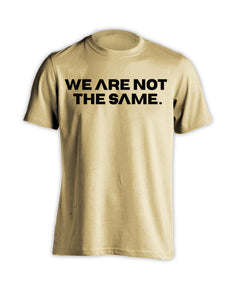 WE ARE NOT THE SAME TEE. - SAND